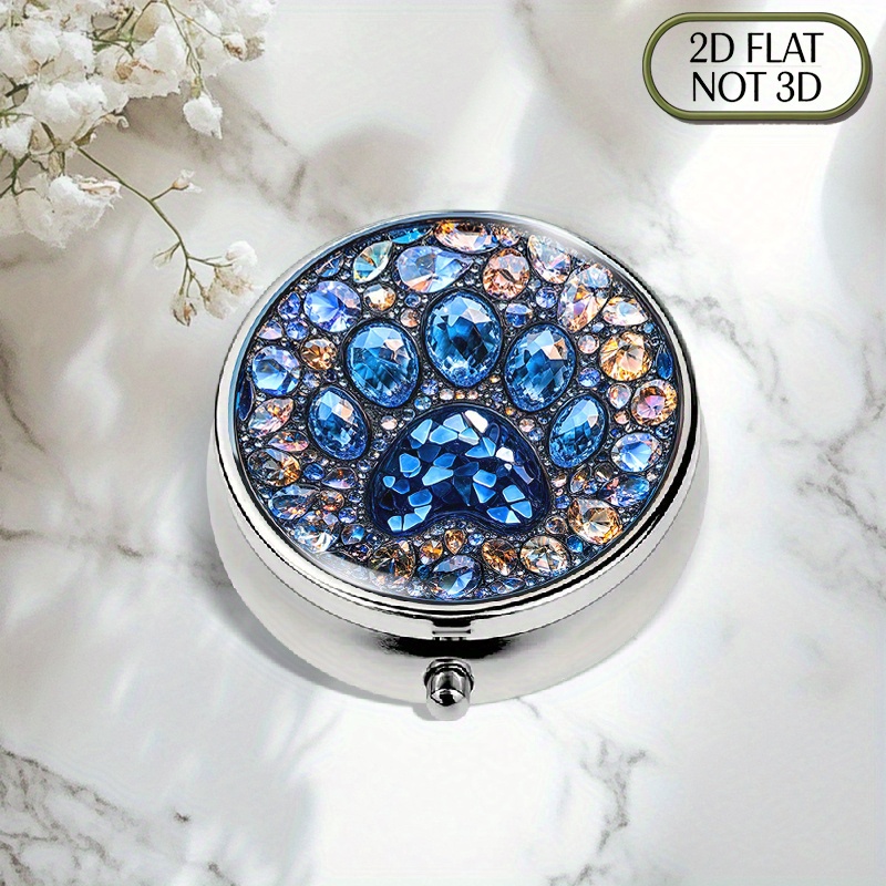 Travel Related Accessories - A flat, portable, round metal pill